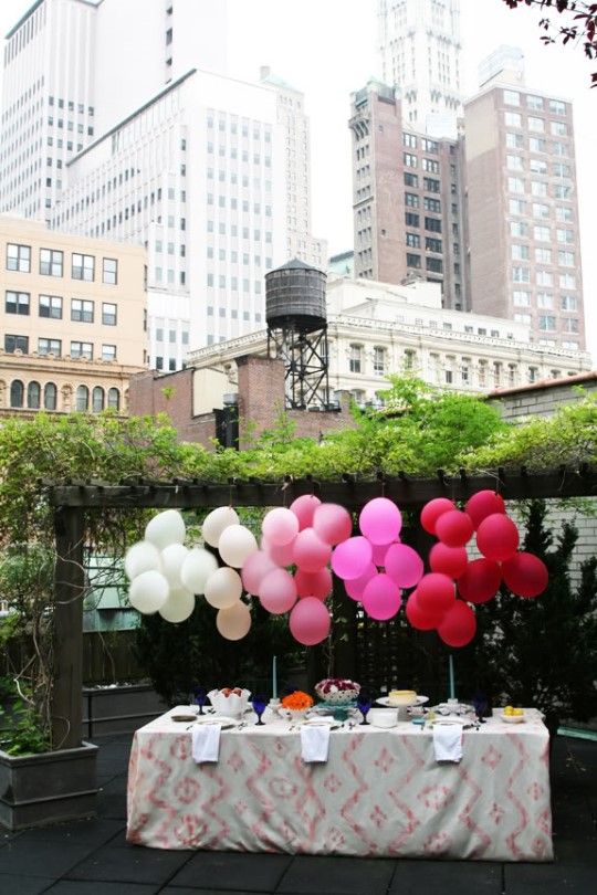 Lovely balloon decor for the mini wedding food table at a rooftop or backyard.