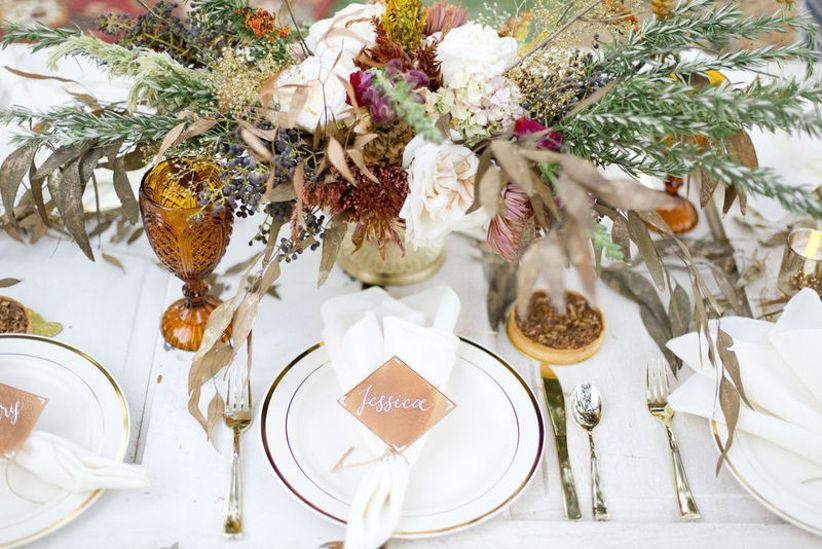 fall wedding place setting with rose gold decor