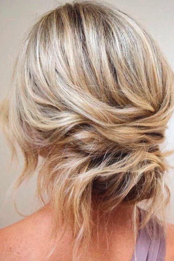 hairstyles-for-medium-length-hair-blonde-messy-bun-min