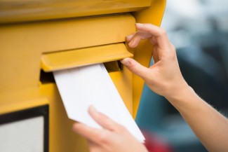 Bride mailing save the dates